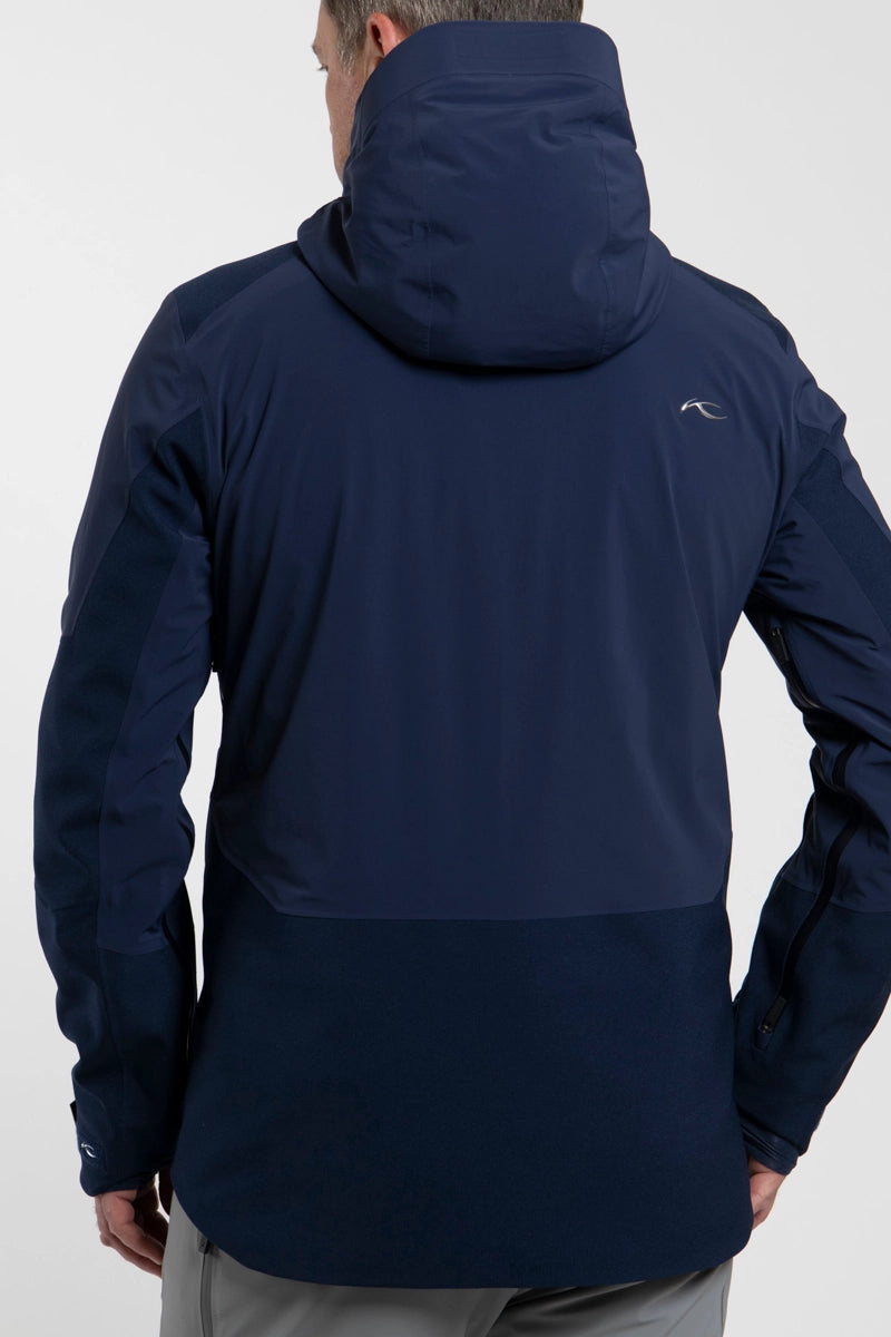 NavyBlue Kjus Men's Ligety Hexair Ski Jacket Model Back View