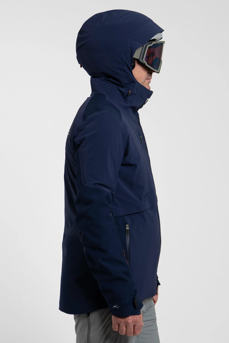 NavyBlue Kjus Men's Ligety Hexair Ski Jacket Model Side View
